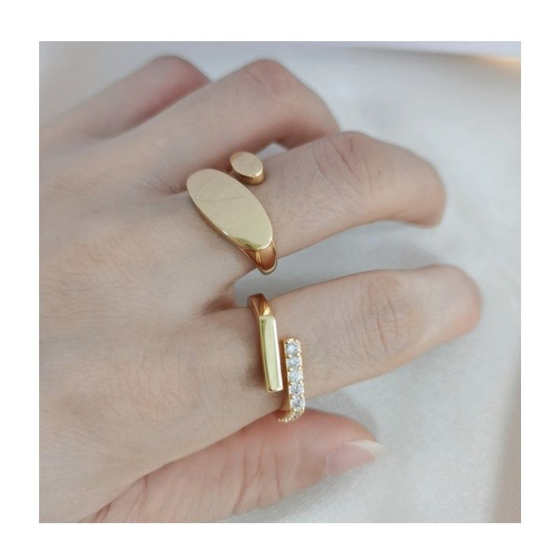 Anello da donna in rame con zircone intarsiato e design geometrico placcato oro_voghion.com