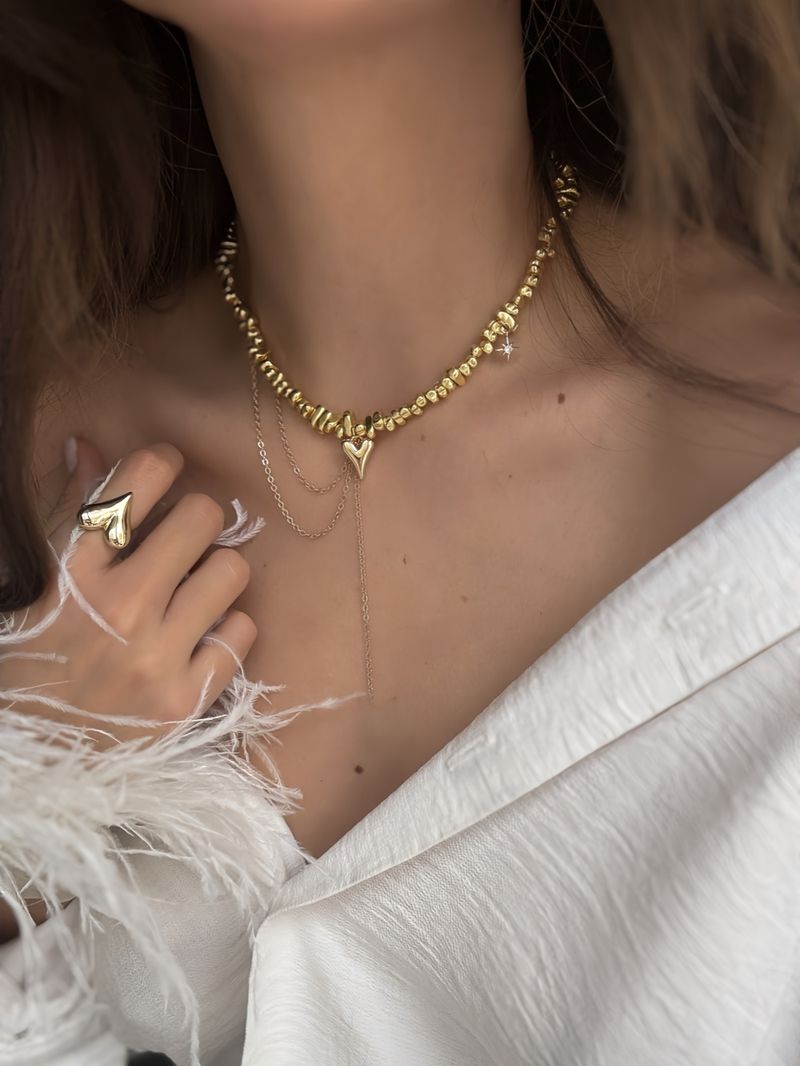 Charmantes Hip-Hop-Halsketten-Accessoire mit unregelmäßigem Kies-Vogel-Quastenanhänger für Damen – ideal für Musikfestivals und den Alltag._voghion.com