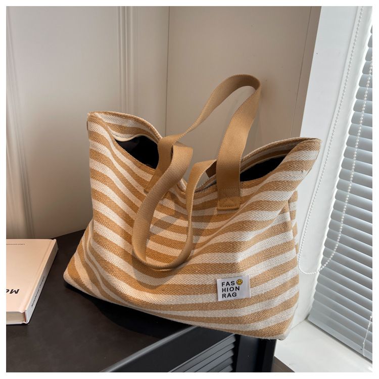 2024 New Spring/summer Popular Simple Shoulder Bag Commuter Handheld Canvas Tote Bag Casual Large Capacity Bag for Women_voghion.com