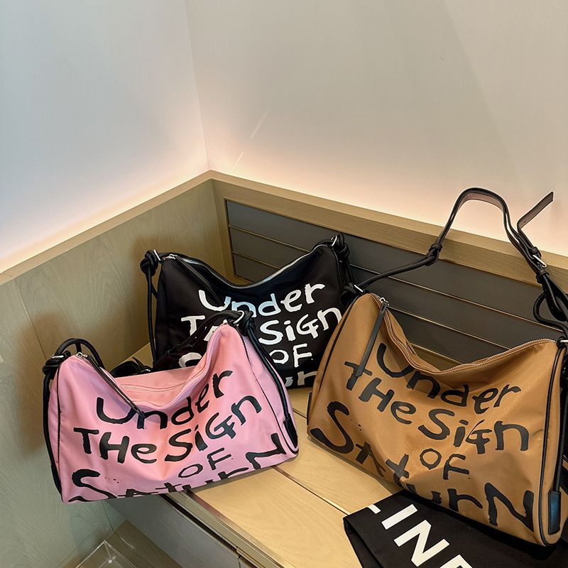 Women's Waterproof Nylon Handbag, 2025 Spring And Summer New Wave Graffiti Leisure Large-capacity Shoulder Bag_voghion.com