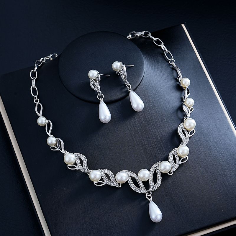 Collana e orecchini con perle a goccia d'acqua, set di accessori da sposa, temperamento alla moda, set da due pezzi da donna all'ingrosso_voghion.com