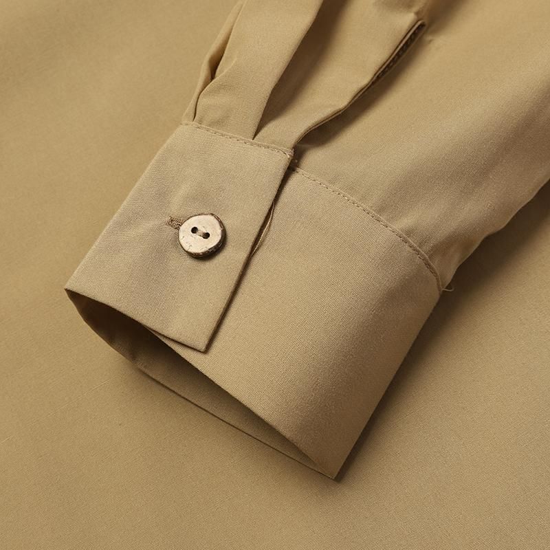 Gonna aderente alla caviglia con colletto alto in pizzo tinta unita, maniche lunghe, cintura annodata, da donna_voghion.com