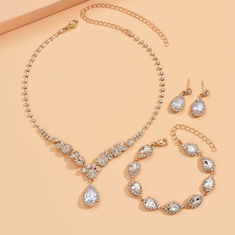 Set di gioielli da donna, alla moda, nuovo, alla moda, in oro rosa, tre pezzi, collana, orecchini, bracciale con zirconi, set da sposa._voghion.com