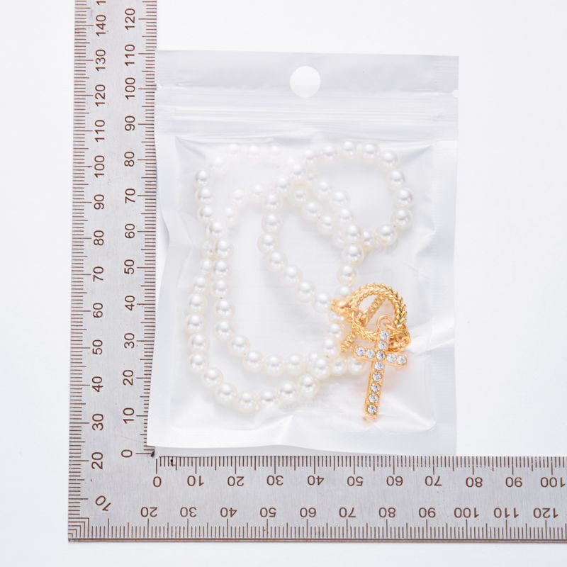 Collane Collana di perle multistrato alla moda e di alta qualità con ciondolo a croce di diamanti Collana per clavicola Collana versatile di nicchia per le donne_voghion.com