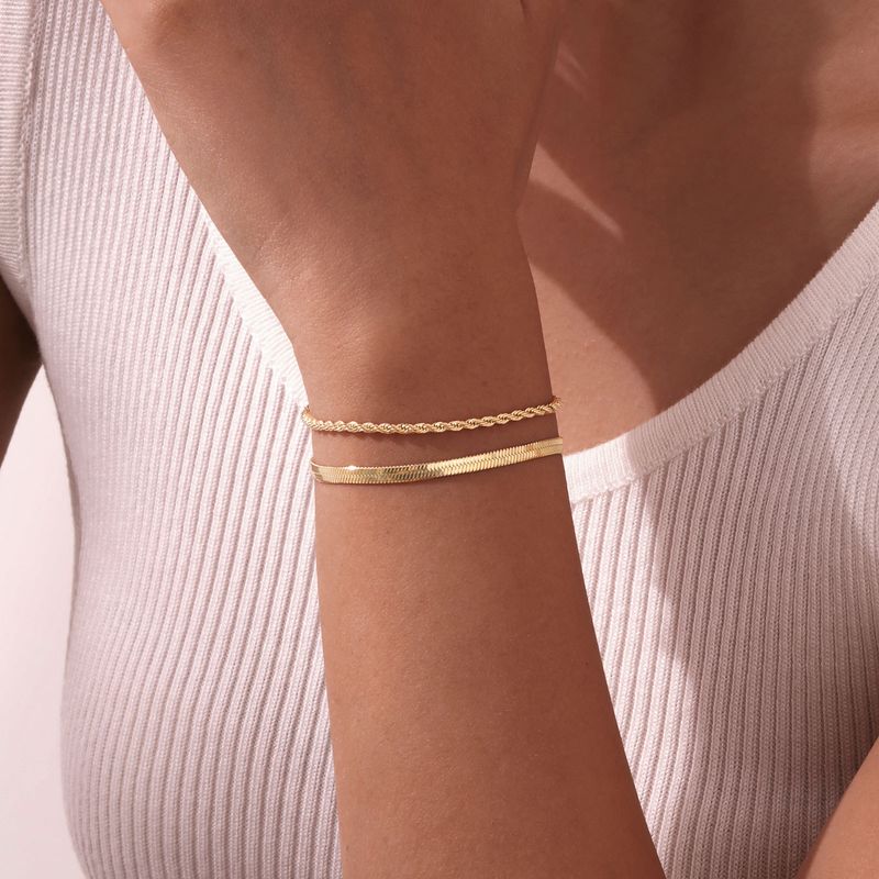 Deeglech villsäitegt gedréinten Schlaangeknacharmband K vergoldet_voghion.com