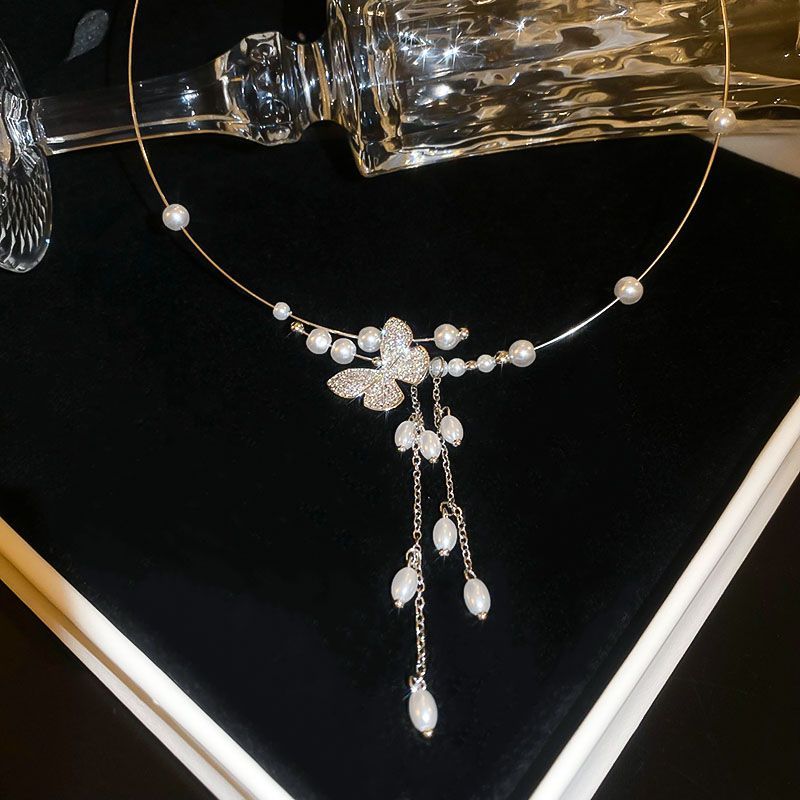 Collar de borlas de perlas y mariposa plateada para mujer, nuevo y popular gargantilla de alta gama de 2024_voghion.com