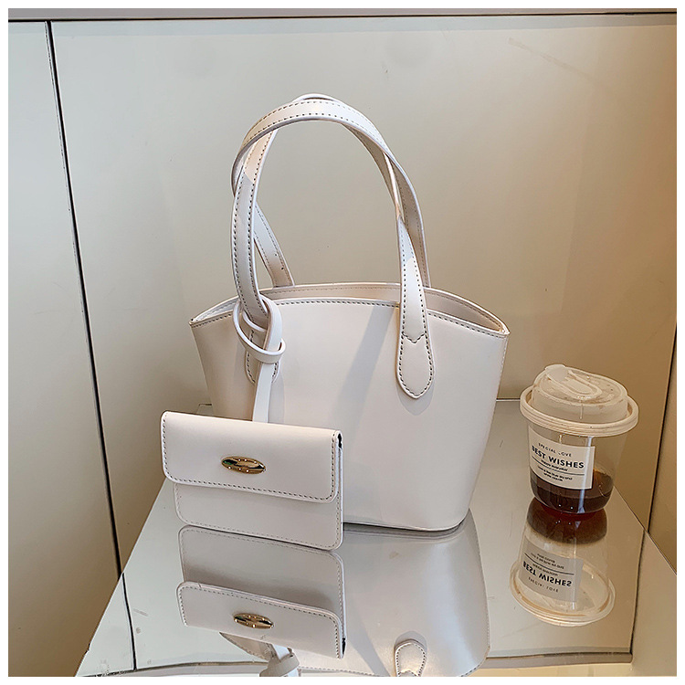 Borsa piccola portatile di moda estiva nuova borsa a secchiello casual semplice da donna 2023 borsa per ascelle suocera con trama di nicchia_voghion.com