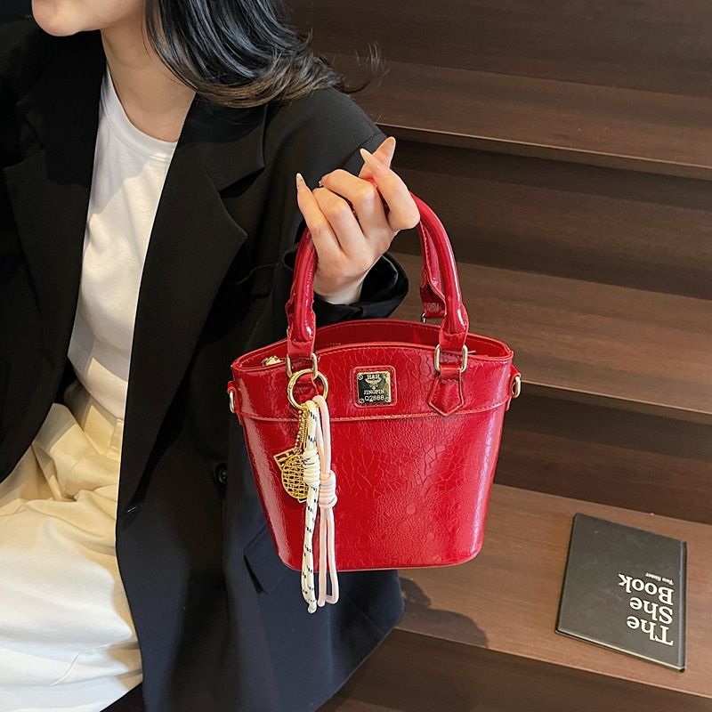 Nuova borsa a mano in tinta unita, tendenza moda, borsa a tracolla versatile da donna, borsa a secchiello di alta gamma per donna_voghion.com