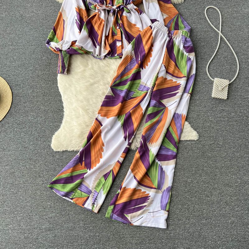 Bedruckter Anzug im Urlaubsstil für Damenbekleidung, zweiteiliges Set mit Rüschenoberteil mit Puffärmeln, Schnürung und Hose mit weitem Bein für Damen_voghion.com