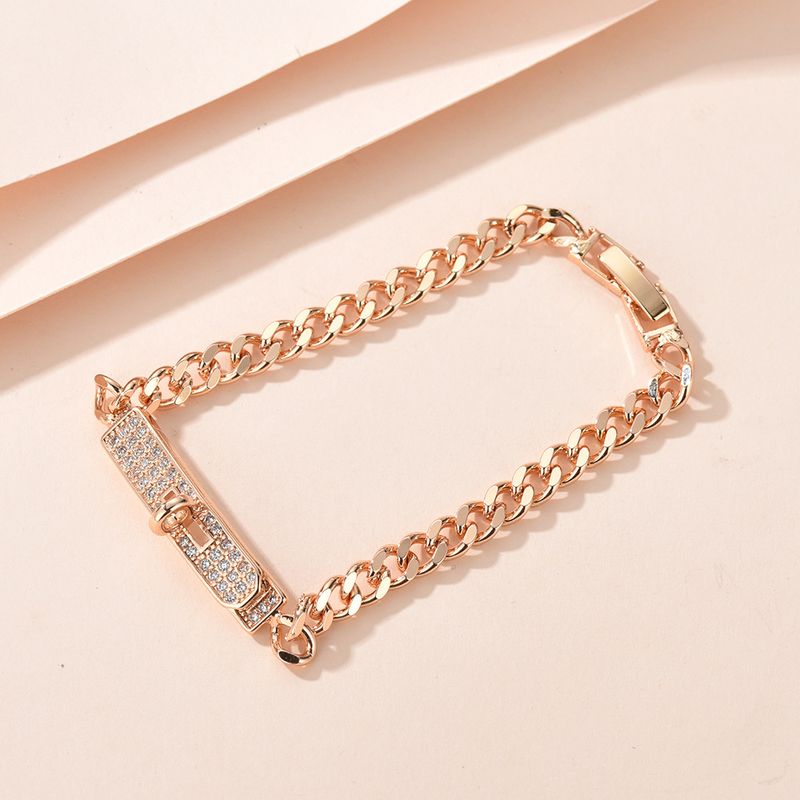 Braccialetto di rame semplice, versatile, alla moda, in oro champagne, con catena cubana leggera e di lusso, con bottoni pieni di diamanti._voghion.com
