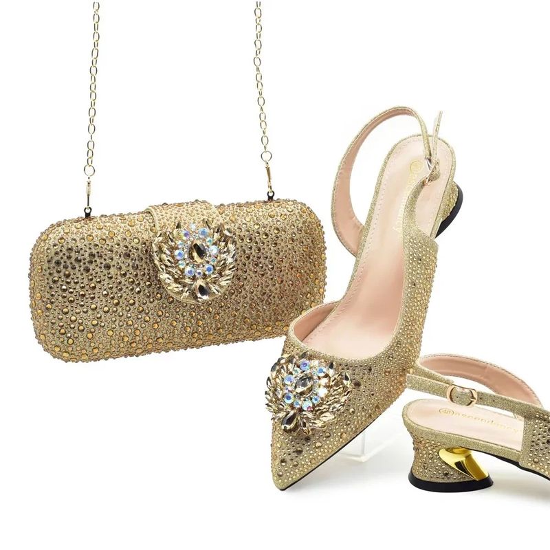 Pair the evening with high-heeled sandals with large flash diamonds and a hard-box jewel tote case filled with diamond high heels_voghion.com