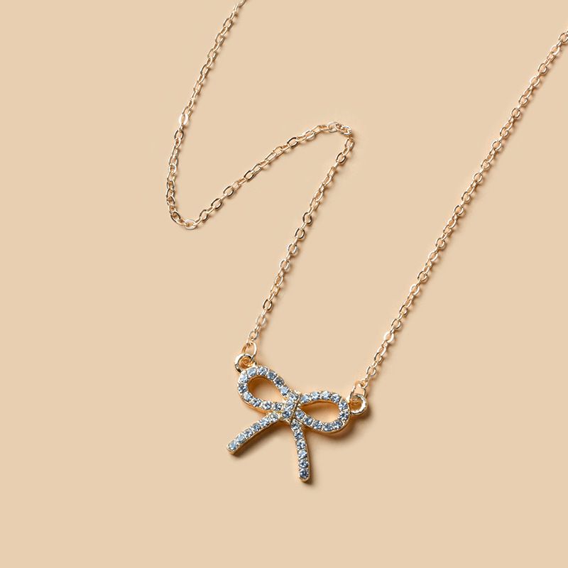Collana con ciondolo a forma di fiocco in lega di diamanti, con catena per maglione da donna_voghion.com