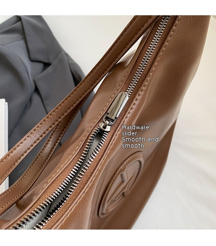 2024 Light Luxury Creative Women's New Cool And Trendy Saddle Bag Fashion Large Capacity Shoulder Bag Solid Color Handbag_voghion.com