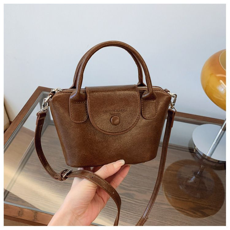 Hih end pleated texture handba for women 2024 niche desin draon bas Xian commutin crossbody versatile shoulder_voghion.com