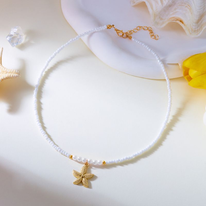 Collana girocollo con perle di riso semplici per donna, casual, versatile, da spiaggia, a forma di stella marina_voghion.com