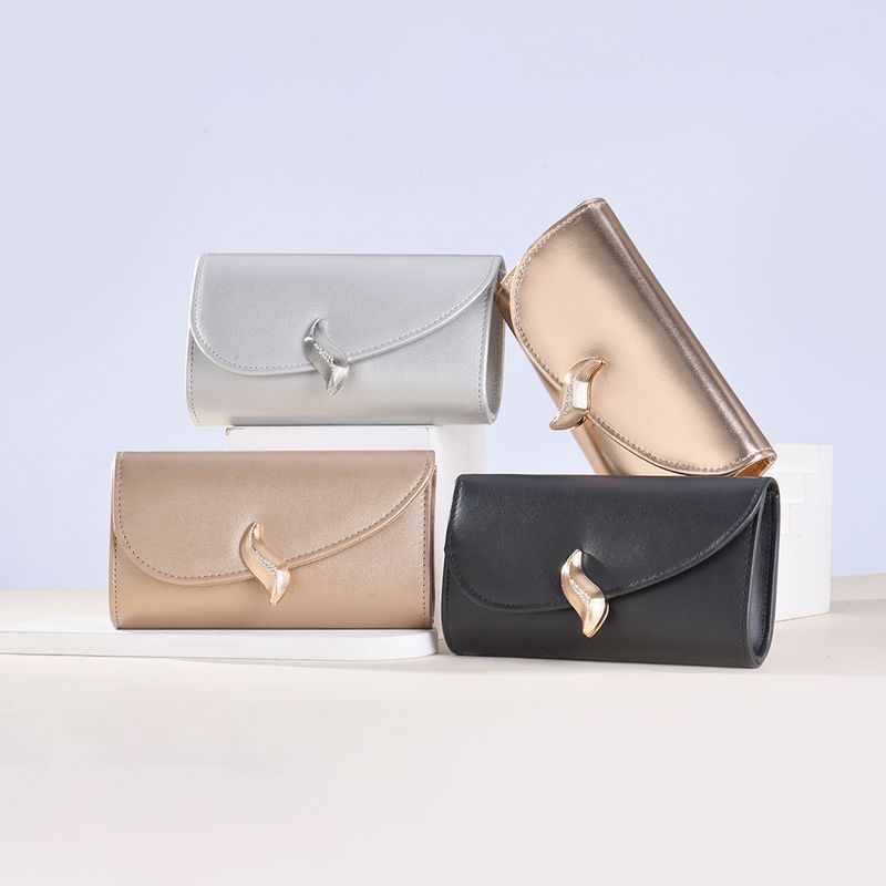 Borse da donna Nuova borsa da sera lunga per donna Borsa a tracolla con fibbia a foglia in morbida pelle PU Spot all'ingrosso_voghion.com