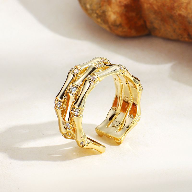 R0089 Anello da donna con nodo di bambù a tre strati, design aperto e zircone placcato oro, per indice_voghion.com