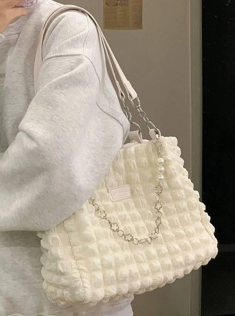 2023 Nuova borsa tote di grande capacità con catena a sbuffo color crema di nicchia, borsa a tracolla portatile morbida e versatile da donna_voghion.com
