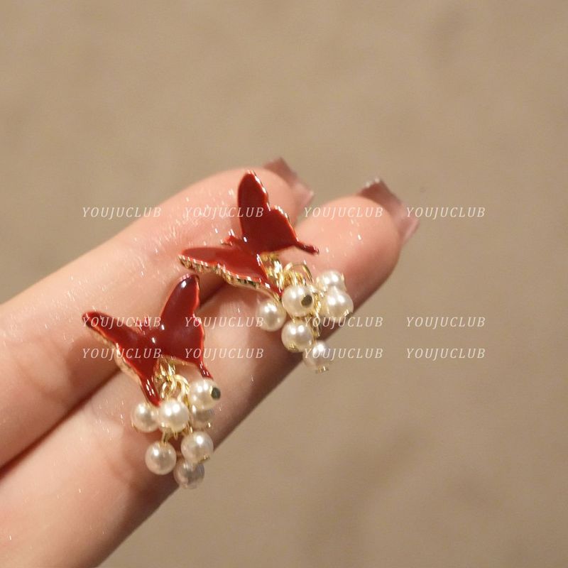 Boucles d'oreilles en perles de papillon en émail rouge Baijiu de style français pour femme, adaptées à l'automne et à l'hiver_voghion.com