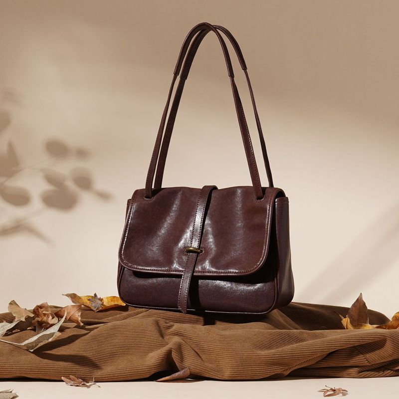 2025 Spring And Summer New Fashion Head Layer Cowhide Tanned Leather Handheld Shoulder Women's Cross Bag_voghion.com