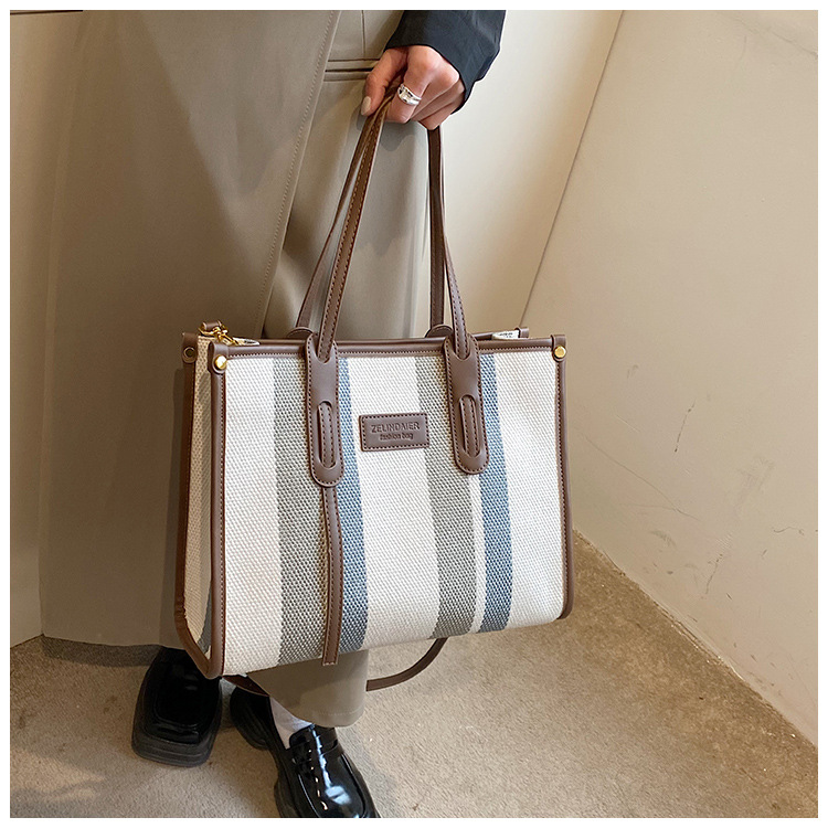 Nowa torba z grubej bawełny o dużej pojemności płócienna torba damska transgraniczny handel zagraniczny kontrastowy kolorowy pasek torba na ramię trend w modzie torba listonoszka_voghion.com