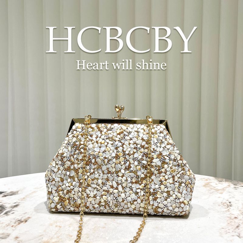 Borsa a mano decorata con conchiglia in pietra dorata, elegante e alla moda, da sera, da donna_voghion.com