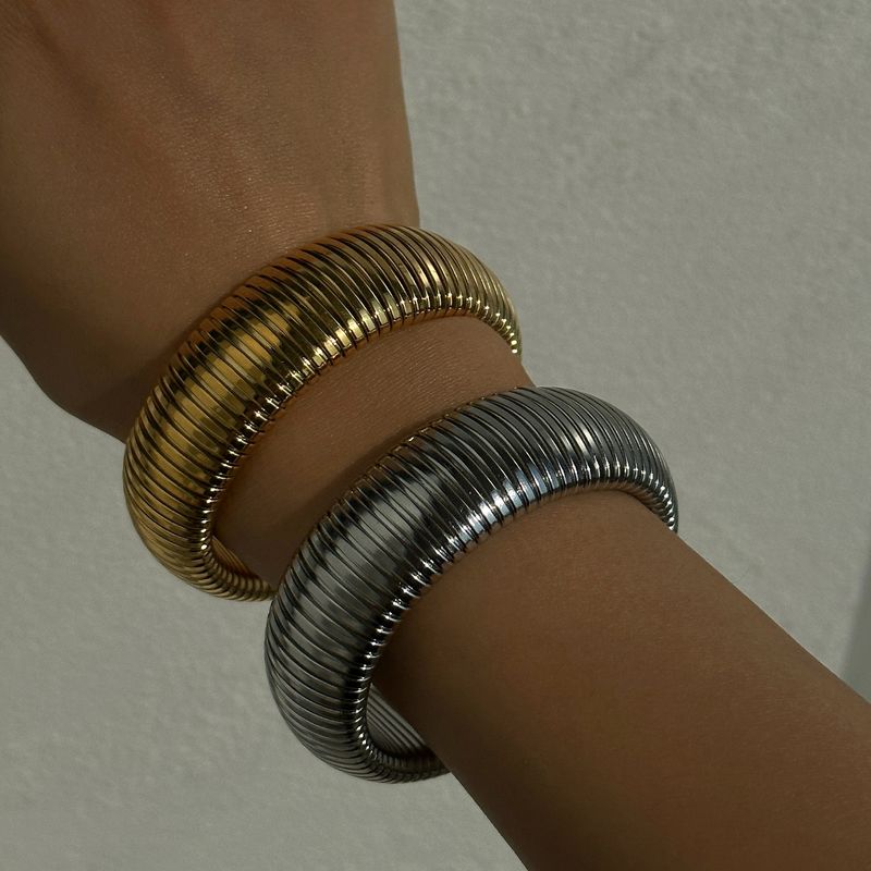 Bracciale Gypsy elastico in acciaio al titanio placcato oro vero_voghion.com