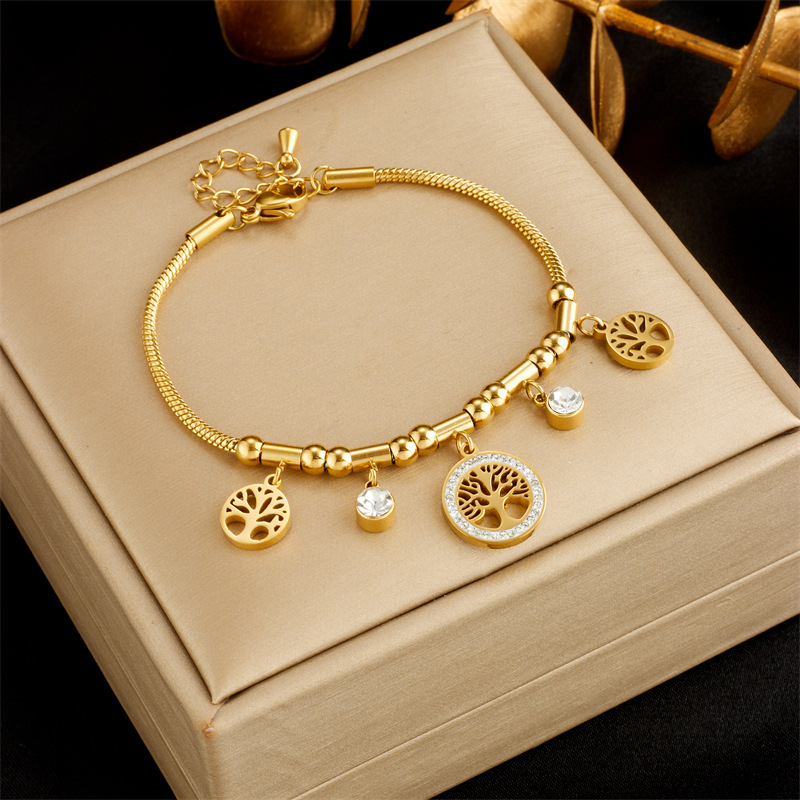 Bracciale con ciondolo albero della vita cavo in metallo con temperamento retrò di fascia alta di nicchia alla moda. Bracciale in acciaio al titanio_voghion.com
