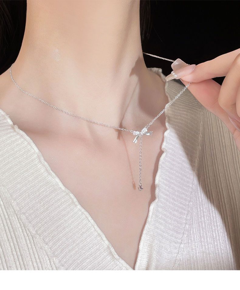 Collana con fiocco in argento puro con un design dal temperamento di nicchia femminile, clavicola dolce leggera e di alta qualità_voghion.com