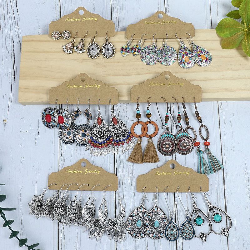 Earrings Fashion Exotic Eyes Beaded Tassel Earrings Hollow Drop-shaped Turquoise Diamond Earrings Set_voghion.com