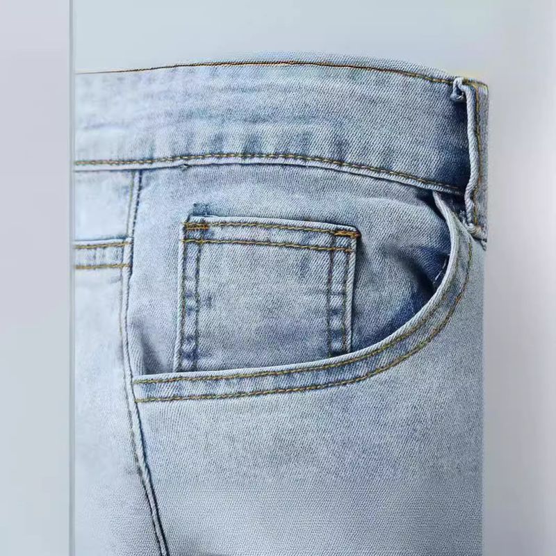 Modische verwaschene Jeans für Herren mit Löchern_voghion.com