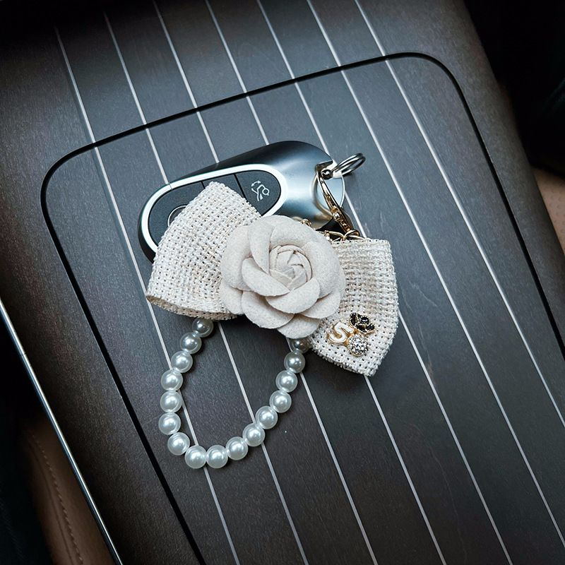 Personalized pearl chain, small fragrance bow, camellia creative and exquisite car keychain, bag decoration, female_voghion.com