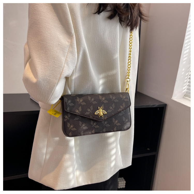 2023 nuova catena di moda singola spalla obliqua straddle piccola borsa versatile borsa a busta retrò piccola borsa quadrata marea_voghion.com