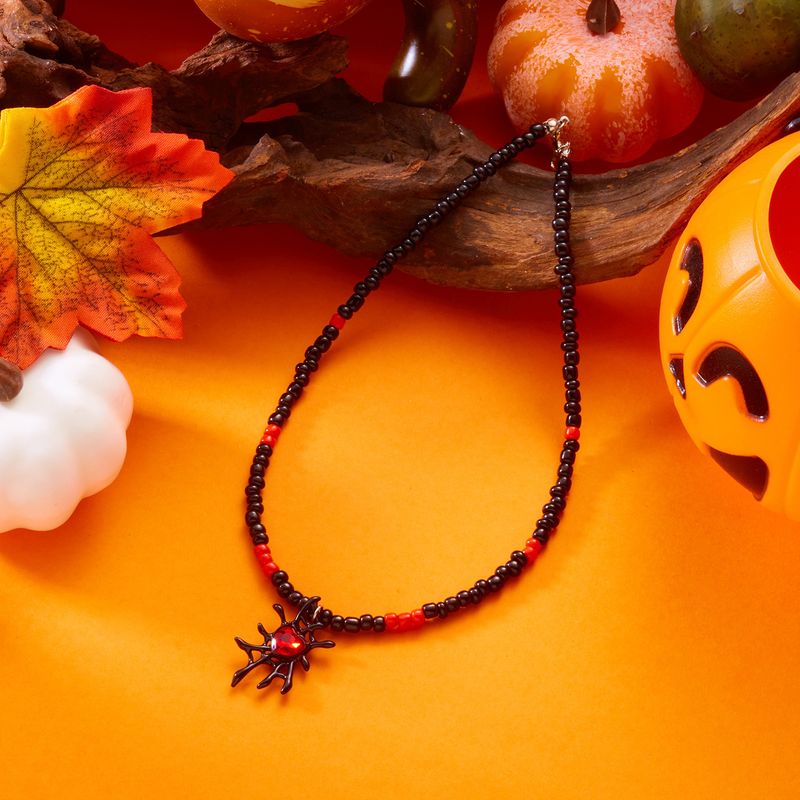 Collana di perline di miglio all'ingrosso, accessori di Halloween in stile gotico scuro europeo e americano, collana con clavicola, zucca, gatto e ragno per le donne_voghion.com