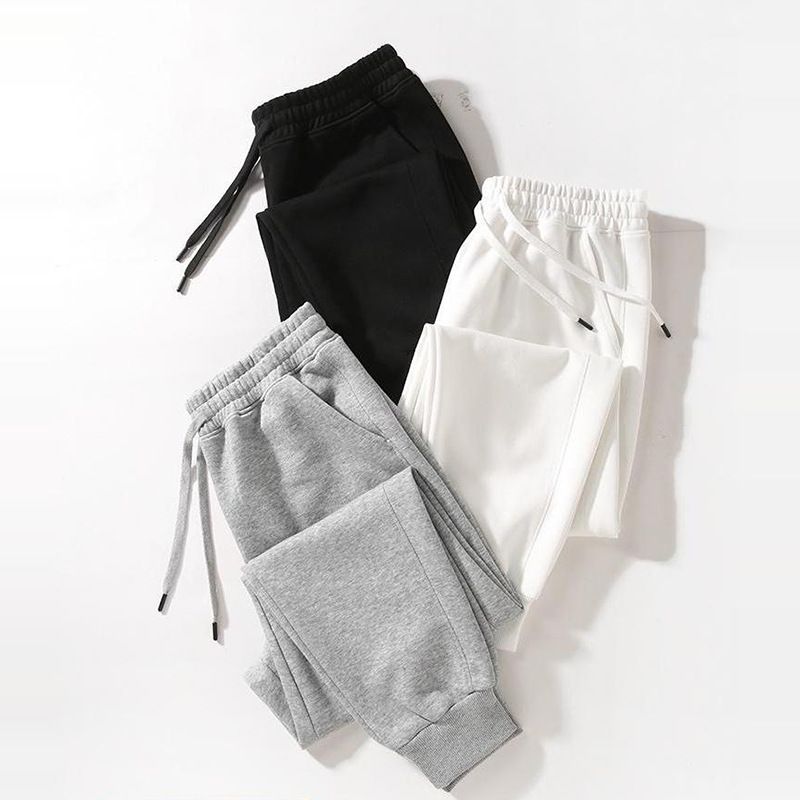 Calças de moletom casuais para homens, calças leggings soltas para primavera e outono, calças esportivas de malha elástica com cordão, calças masculinas da moda_voghion.com