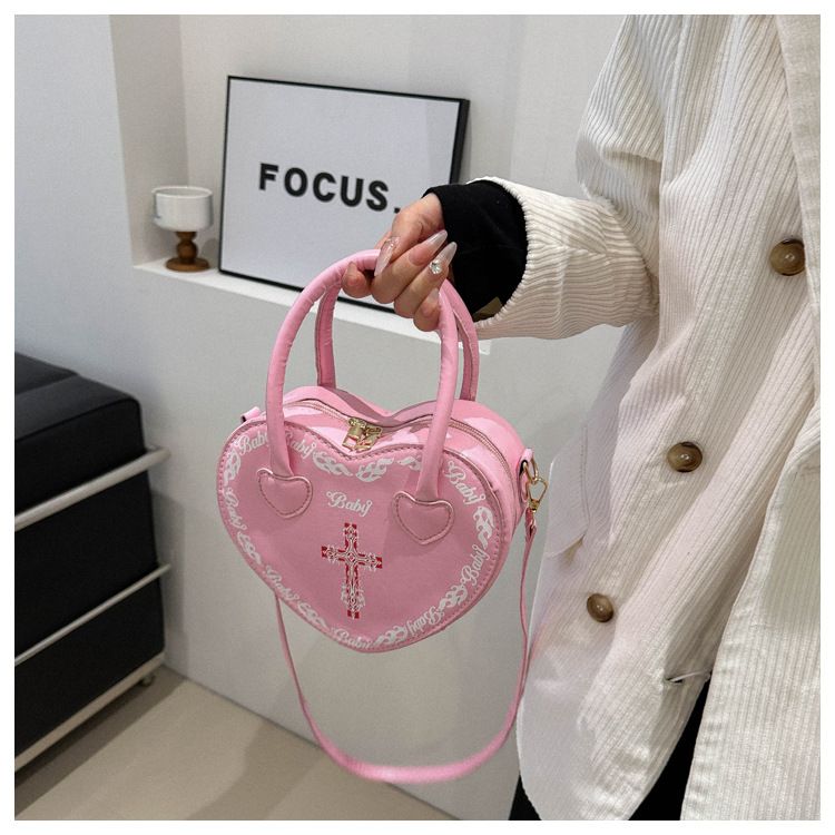 Borsa da donna personalizzata Rivet Punk Dark 2024 Nuova borsa a forma di cuore, borsa a tracolla incrociata, borsa a tracolla per donna_voghion.com