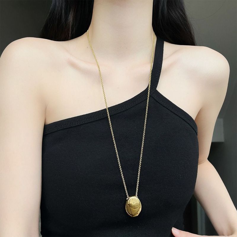 2025 Women Fashion Brand new matte metal oval pendant, geometric long women's sweater luxurious and charming fine necklace, artificial_voghion.com