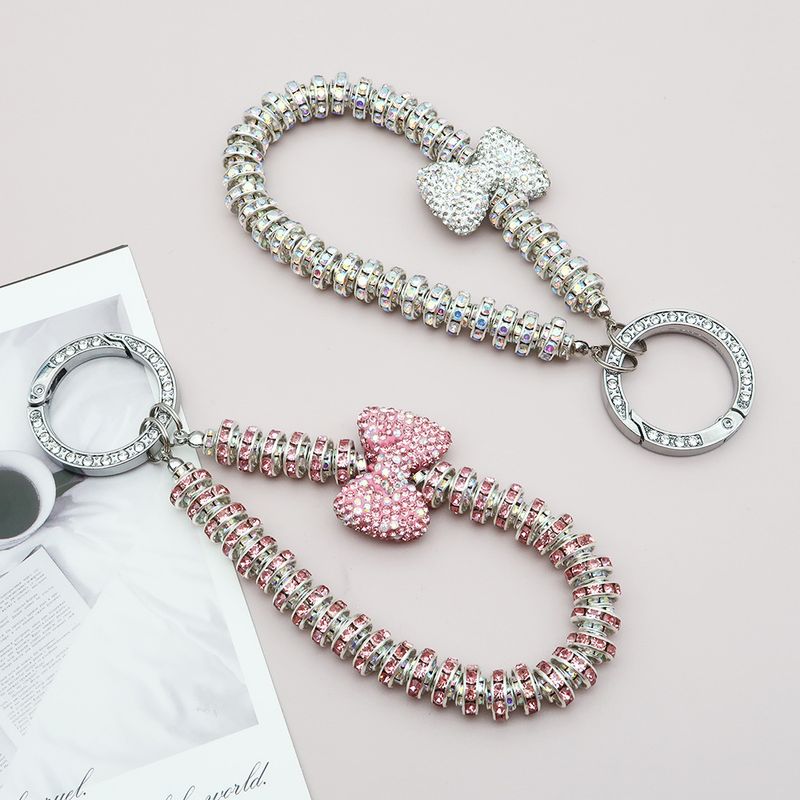Dames licht luxe klei vol diamanten strik sleutelhanger anti-verlies diamanten ring sleutelhanger armband diamanten mobiele telefoon hanger_voghion.com
