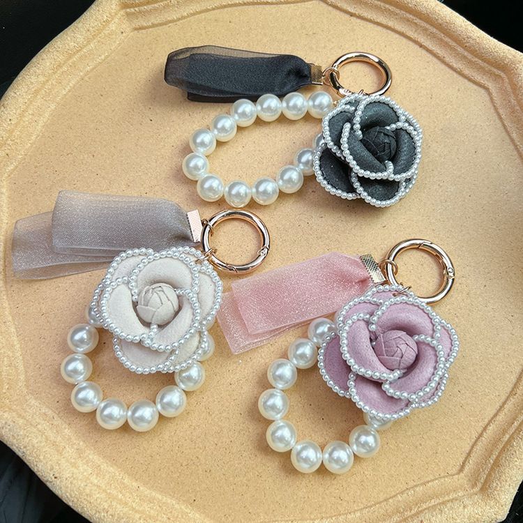 Personalized pearl element camellia lace simple women's bag pendant keychain Korean version_voghion.com