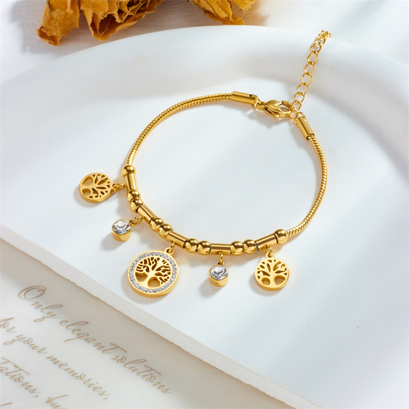 Bracciale con ciondolo albero della vita cavo in metallo con temperamento retrò di fascia alta di nicchia alla moda. Bracciale in acciaio al titanio_voghion.com
