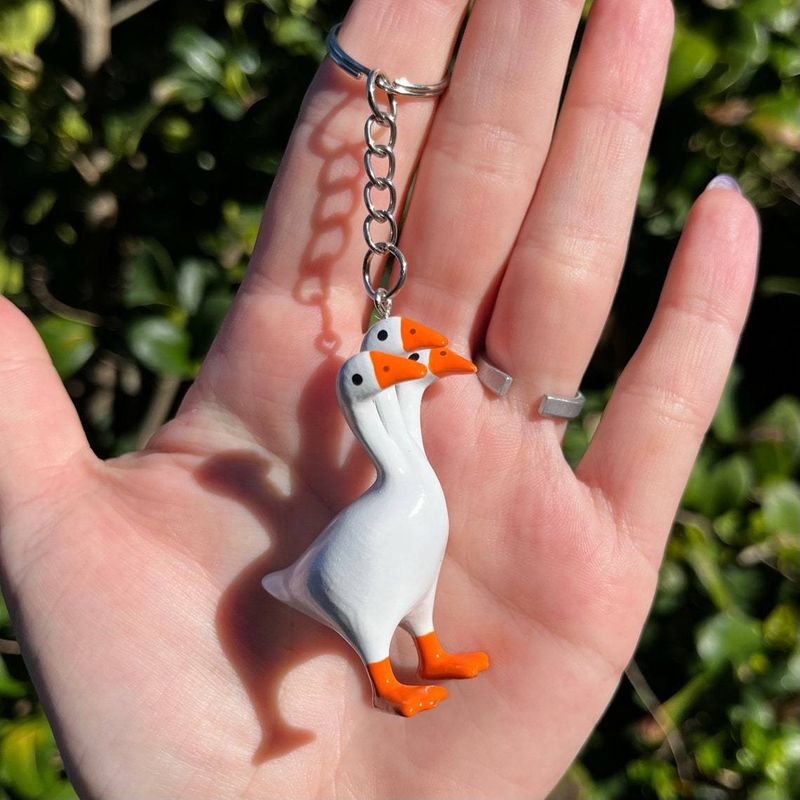 New products Cute three-headed goose pendant keychain keychain Fashionable and cute gift for girlfriend_voghion.com