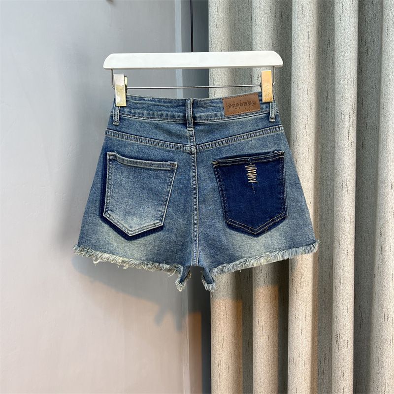 Pantaloncini in denim sfilacciati a vita alta alla moda color-block per donna 2023 estate nuovi lavati larghi a trapezio con risvolto a gamba larga_voghion.com