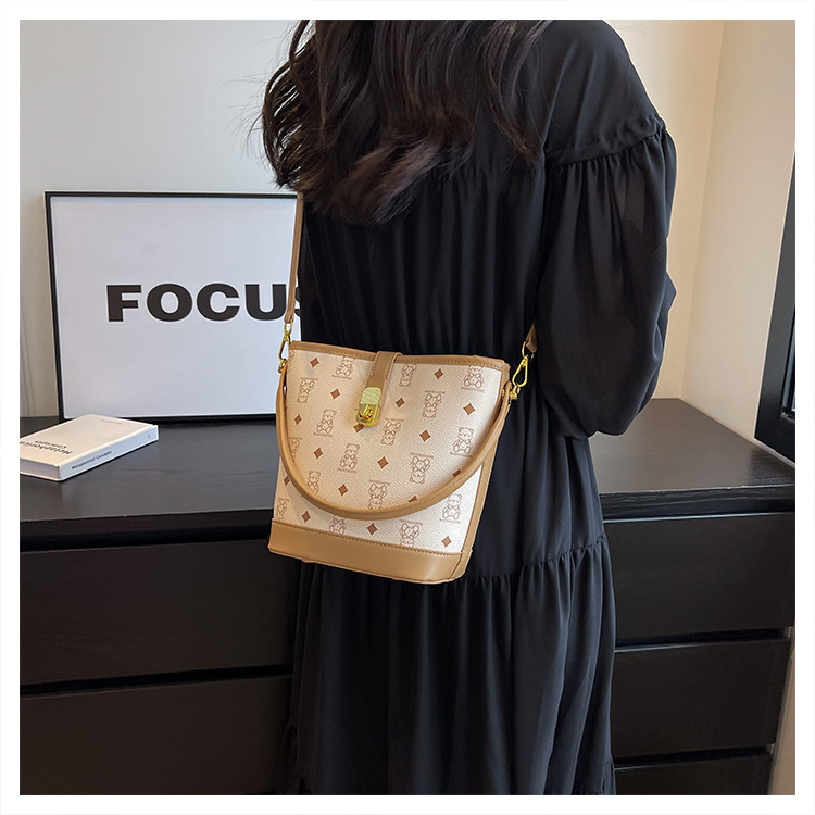 Bolso de cubo de alta calidad para mujer 2023 nuevo bolso de hombro con estampado retro de moda, diseño de nicho, bolso versátil_voghion.com