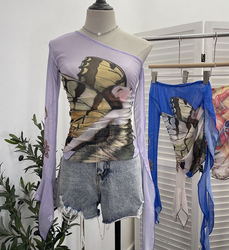 Abbigliamento da donna Real Shot Design, maglietta corta aderente e sottile con lacci, a maniche lunghe e monospalla, in rete stampata_voghion.com