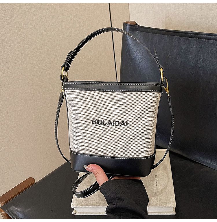 2025 Neue modische Patchwork-Beuteltasche im Farbblock-Stil mit gestickten Buchstaben für Damen_voghion.com