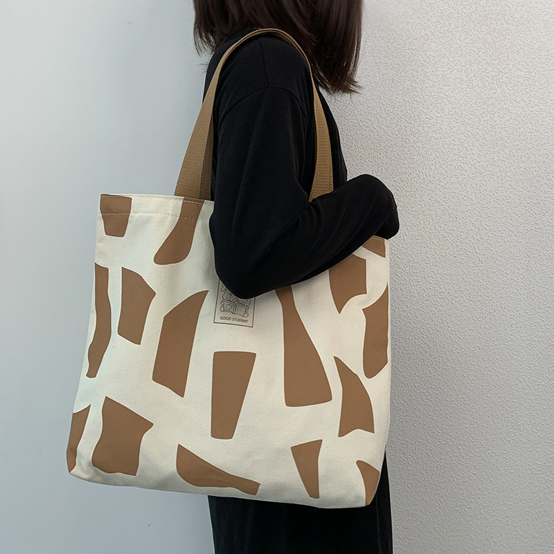 Tela da donna monospalla per lezione, outfit da studentessa universitaria, stile coreano Instagram con cerniera, design artistico,_voghion.com