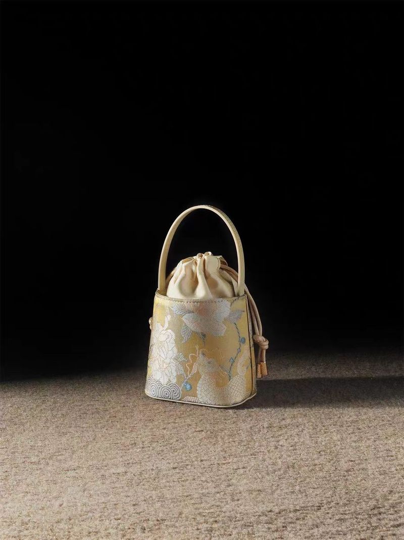 Borsa a secchiello portatile da donna in stile nazionale cinese Kirin Peony, mini 2025_voghion.com