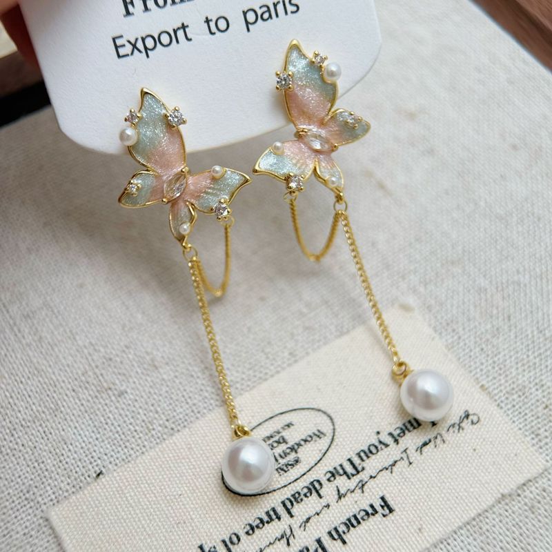 Orecchini di perle squisite coreane con nappa lunga e farfalla, di lusso leggero e di alta qualità, da donna_voghion.com