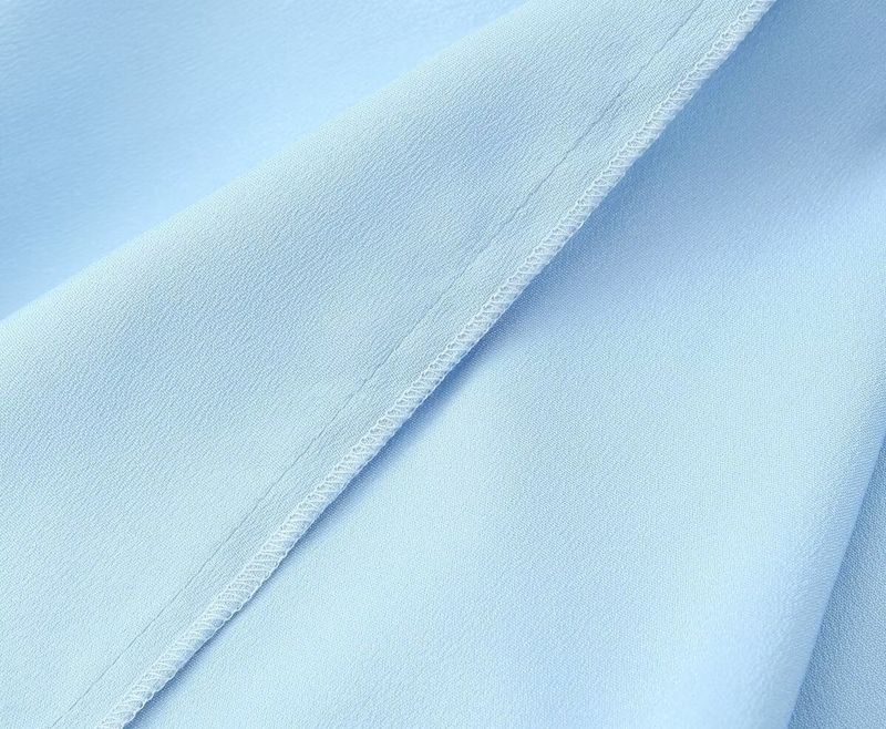 Completo top con nodo a farfalla e pantaloni in raso da donna estate 2024_voghion.com