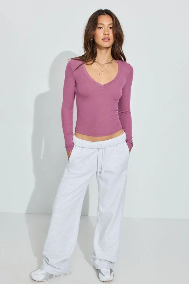 Top basic sexy aderente a maniche lunghe con scollo a V per donna - Blusa casual in maglia elasticizzata a coste, stile streetwear, capo versatile da indossare a strati_voghion.com